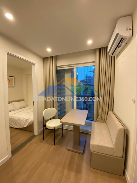 Bán tòa nhà apartment đê la thành, đống đa - 74m x 7t thang máy - mt 7m - dòng tiền 1.2 tỷ/năm - giá 22 tỷ